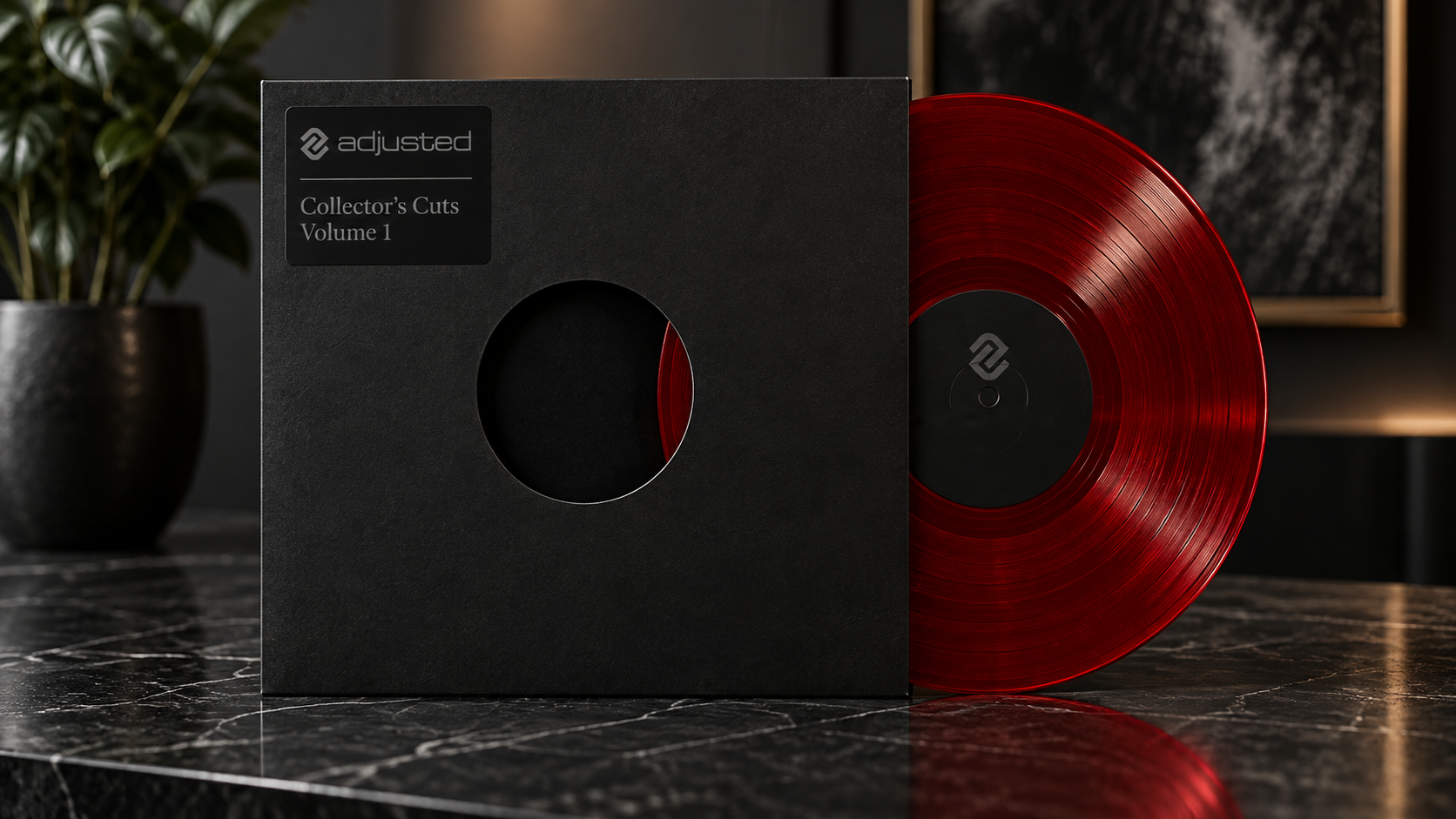 Illustrative Collector’s Cut black sleeve and translucent red vinyl record
